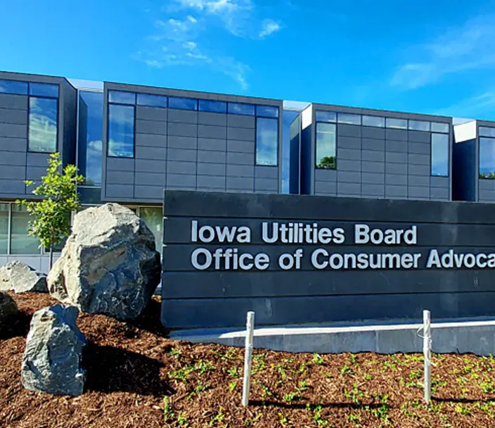 New signage outside the IUB-OCA building in Des Moines