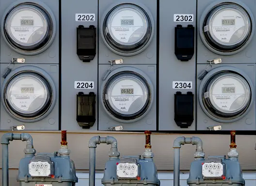 Bank of electric and natural gas utility meters