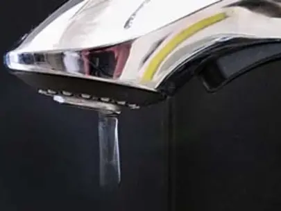 A faucet leaking water